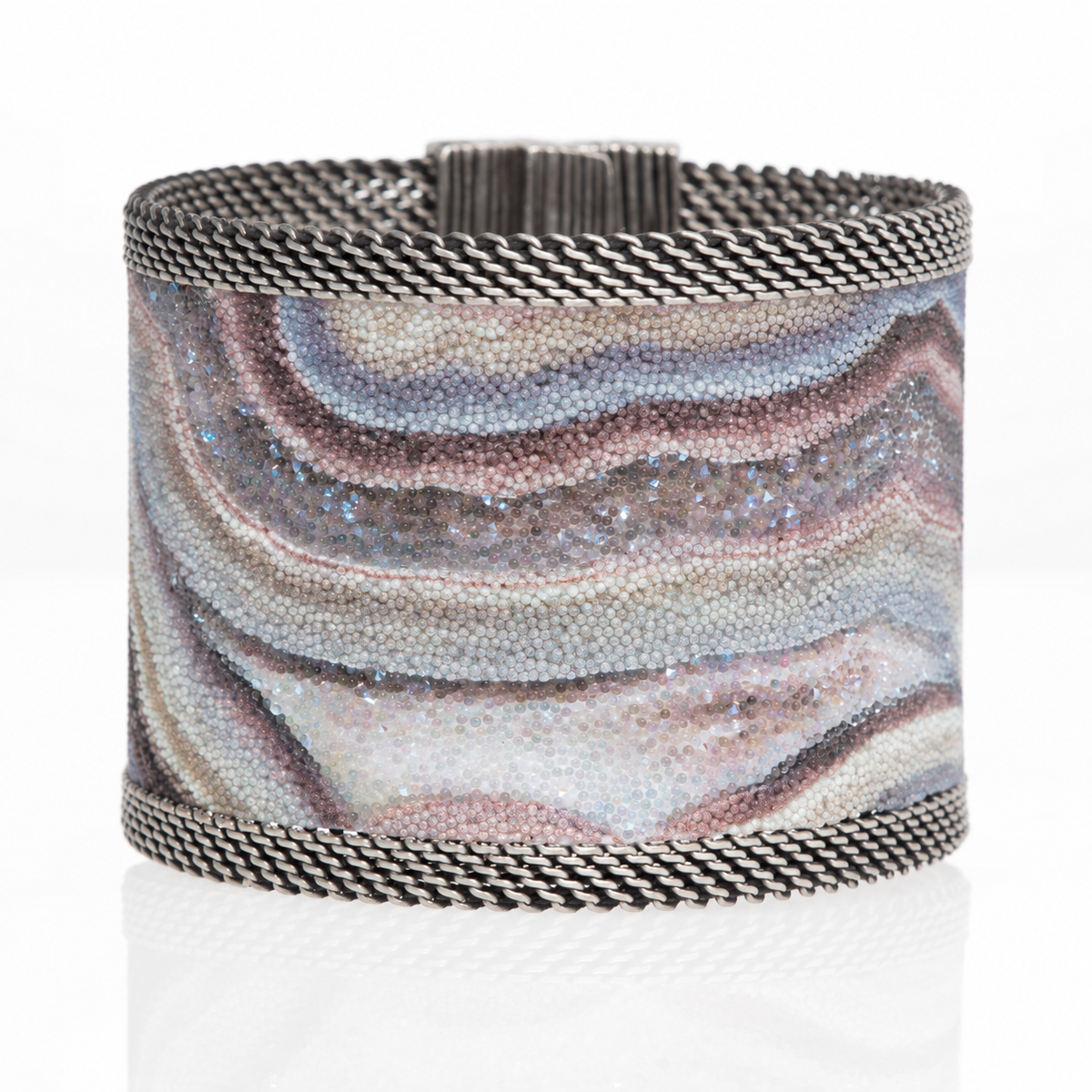 Wide Botswana agate cuff with Swarovski micro-crystals and oxidized silver mesh, shown closed on a white background.