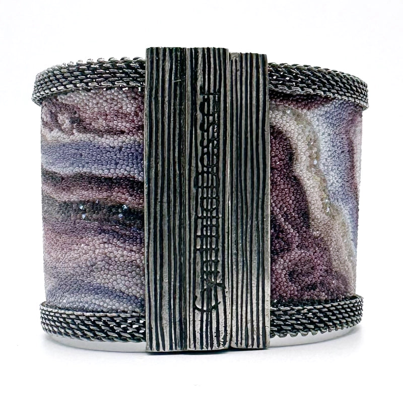 Back view of wide cuff bracelet, closed to show off the signature Cynthia Desser magnetic clasp, with oxidized silver mesh framing a multi-color Botswana agate slice pattern highlighted by shiny and matte Swarovski micro-crystals, on a white background.